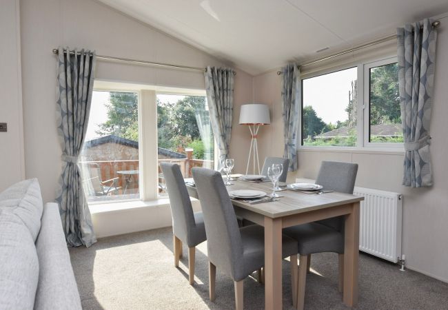 Rowan Lodge Family Holiday Lodge dining area for four people