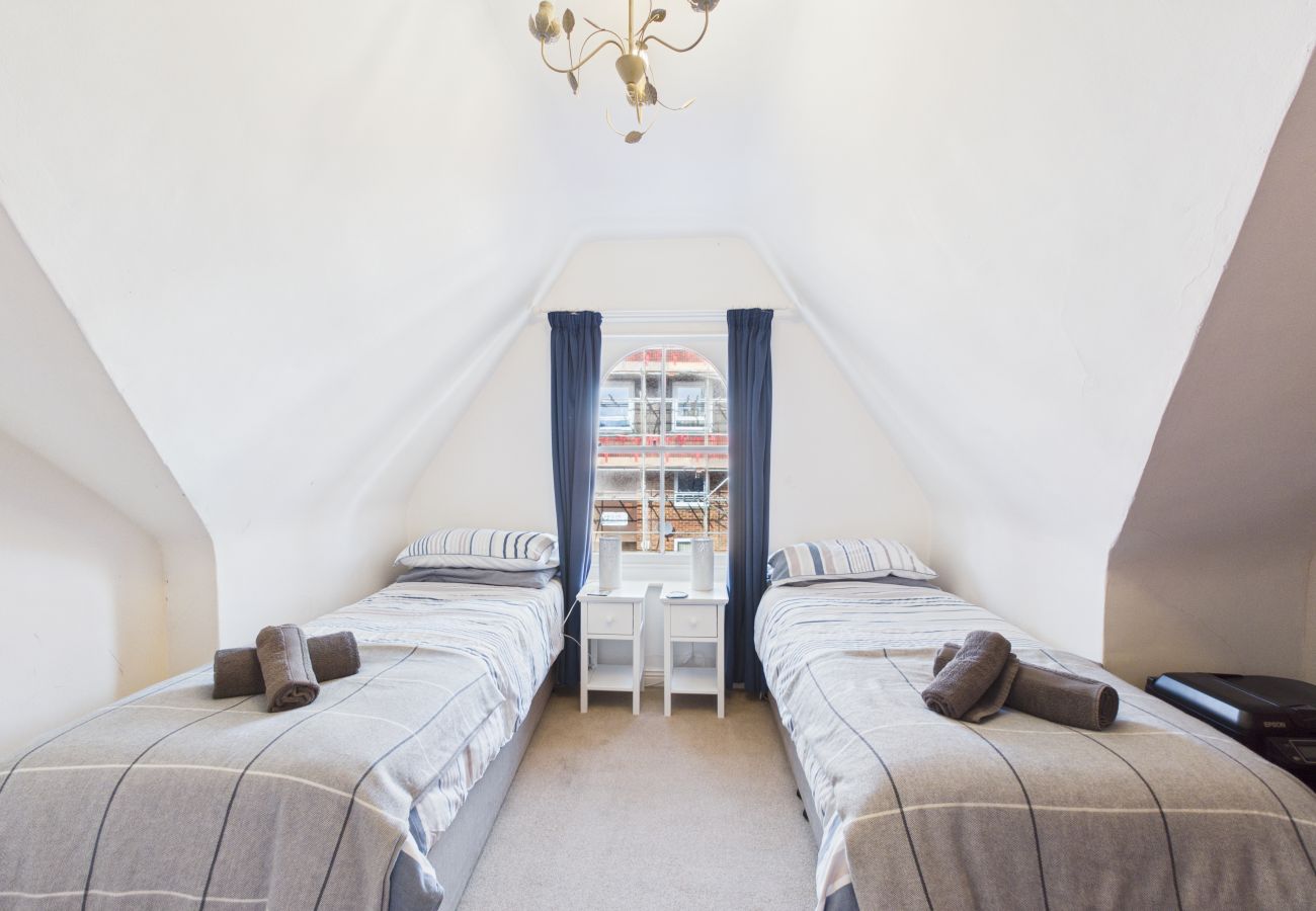 Top floor twin or king bedroom at Granville Coast holiday home