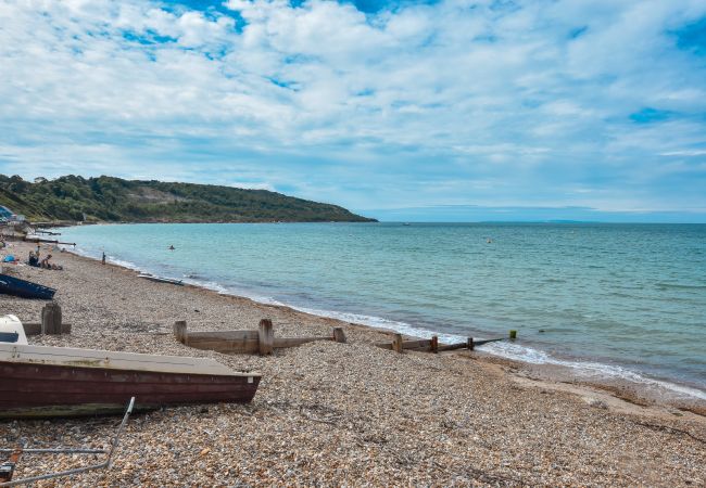 Totland Bay beach leading to The Waterfront.