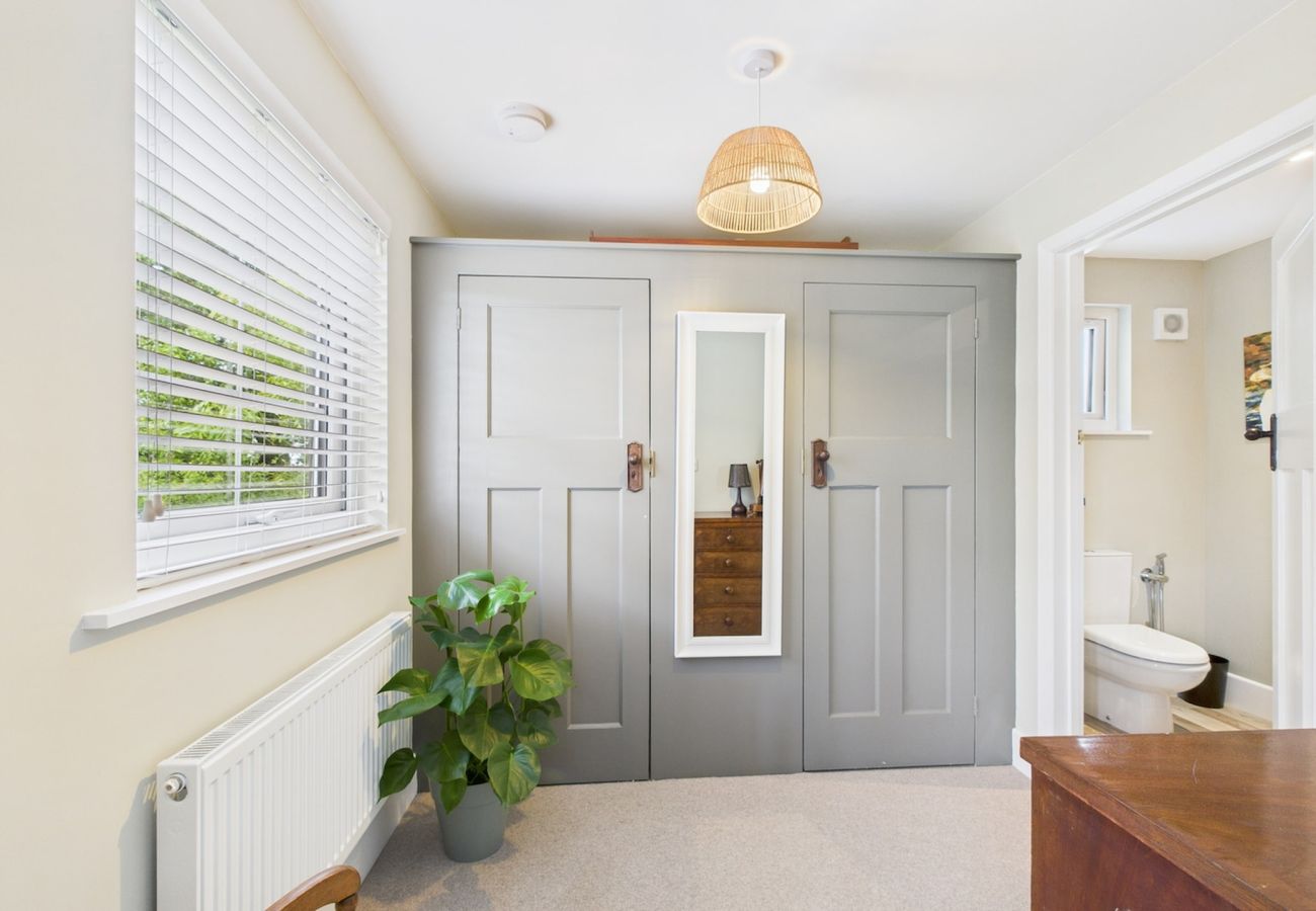 Dressing room attached to second master bedroom at The Timbers holiday home